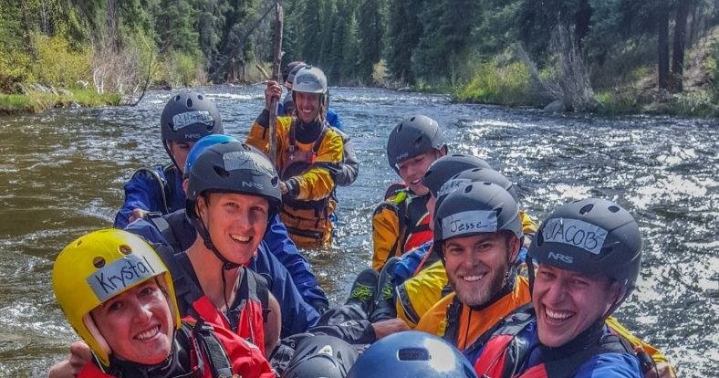 a group of people on a raft