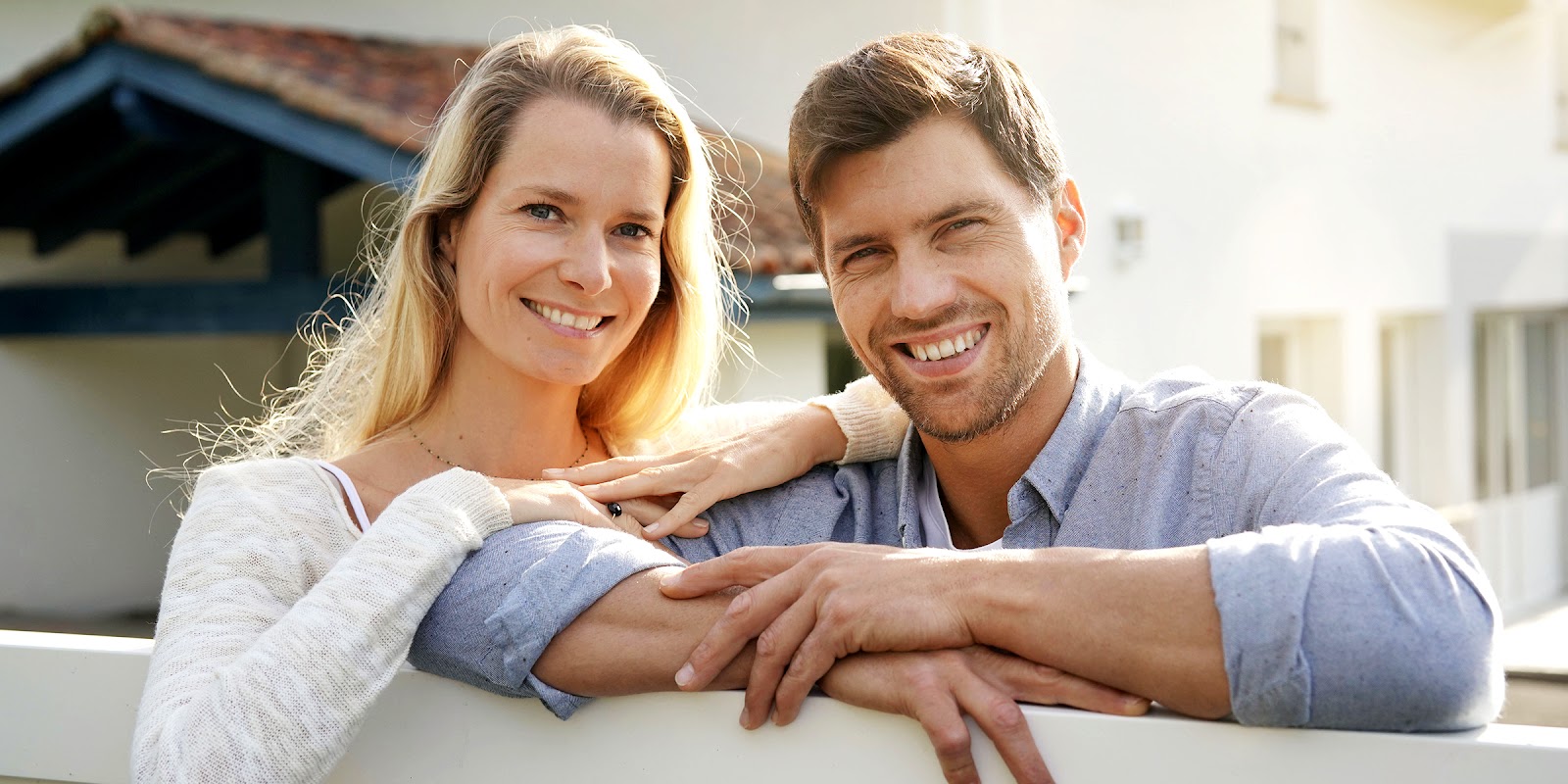 A smiling man and woman | Source: Shutterstock