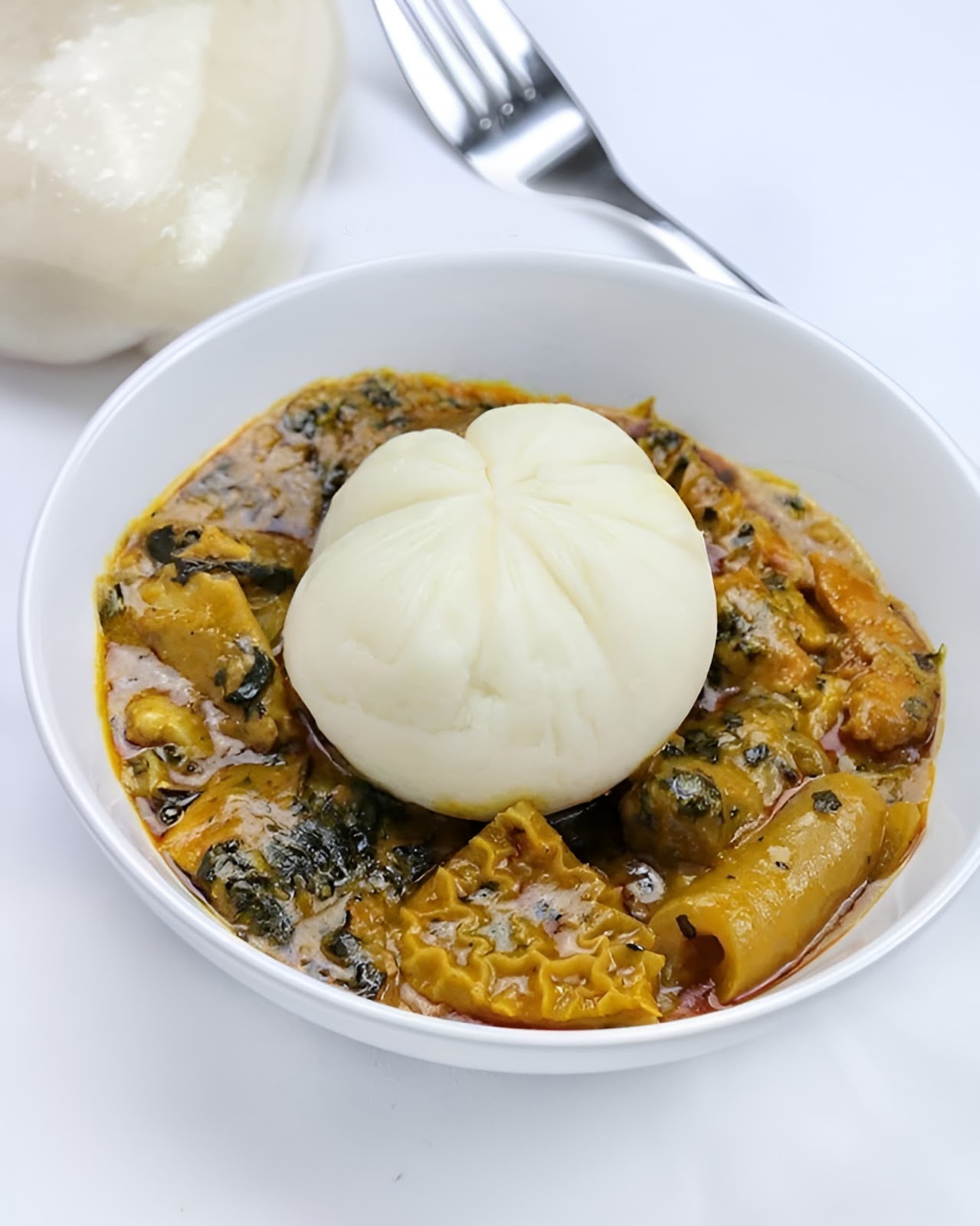 Pouunded yam and ogbono soup