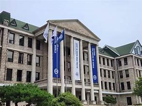 A building with flags in front of it

AI-generated content may be incorrect.