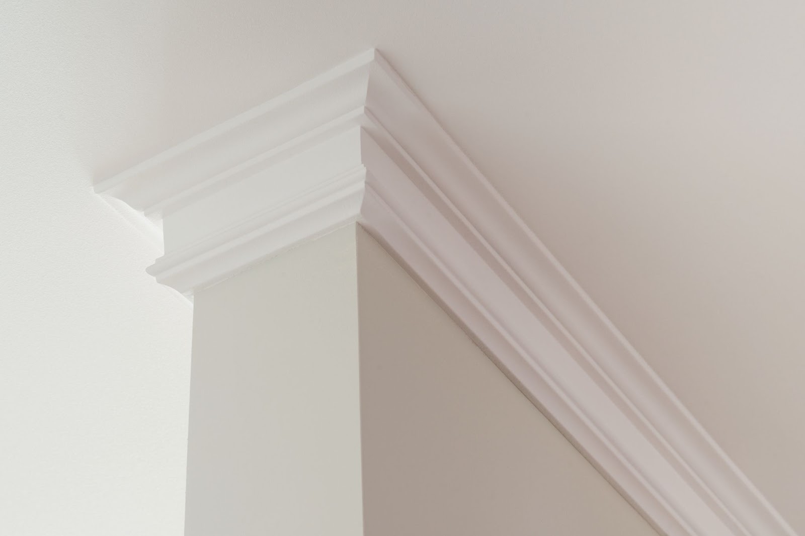 Trim on a wall near the ceiling. 