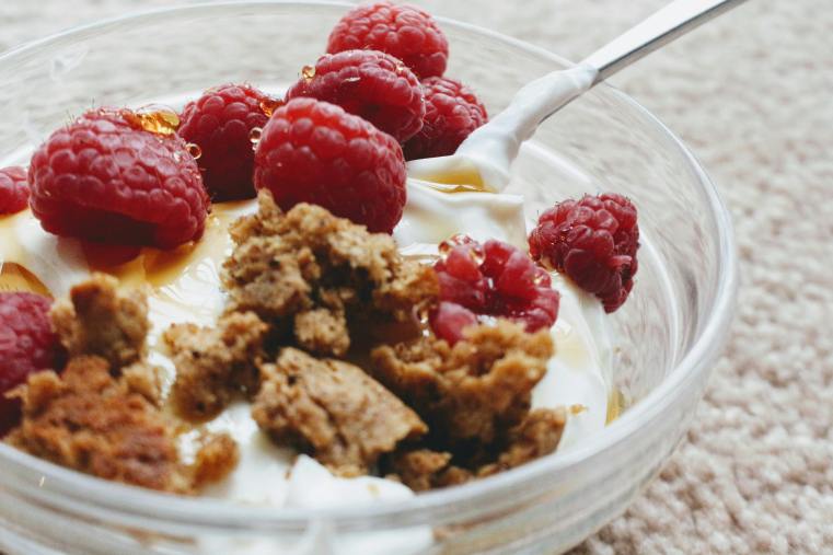 Free Delicious Greek yogurt with biscuit crumb and fresh raspberries Stock Photo