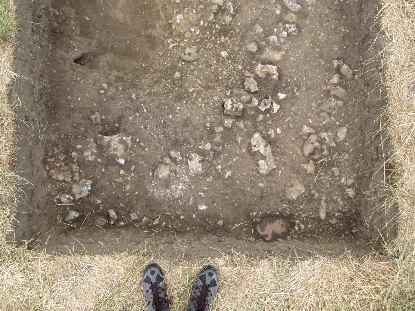 A person standing in the dirt

AI-generated content may be incorrect.