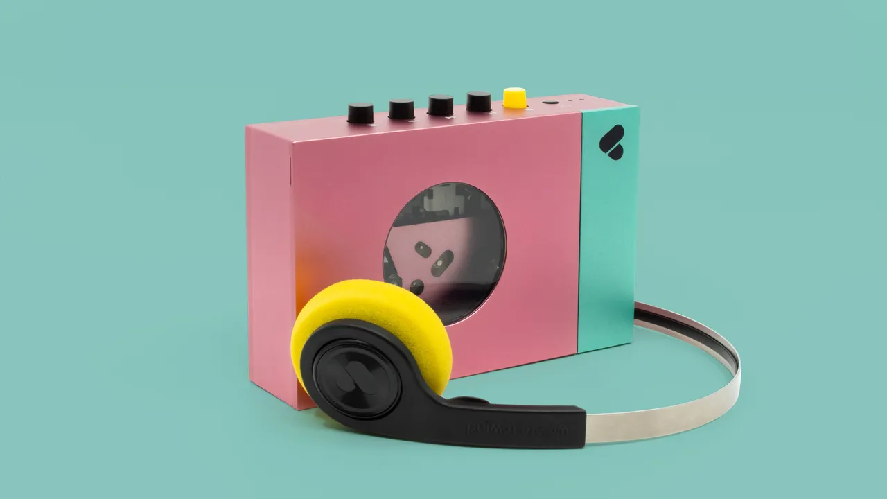 Edith WE-001 cassette player by We Are Rewind, with EQ-001 wireless headphones.
