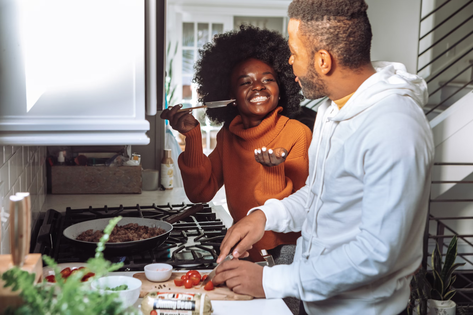 couple cooking together