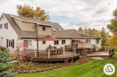 when to hire a michigan deck installer large composite decking space with umbrellas and large yard custom built okemos
