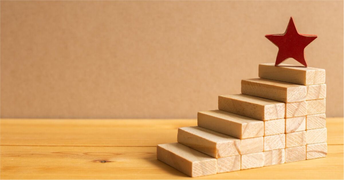 Star on top of wooden blocks