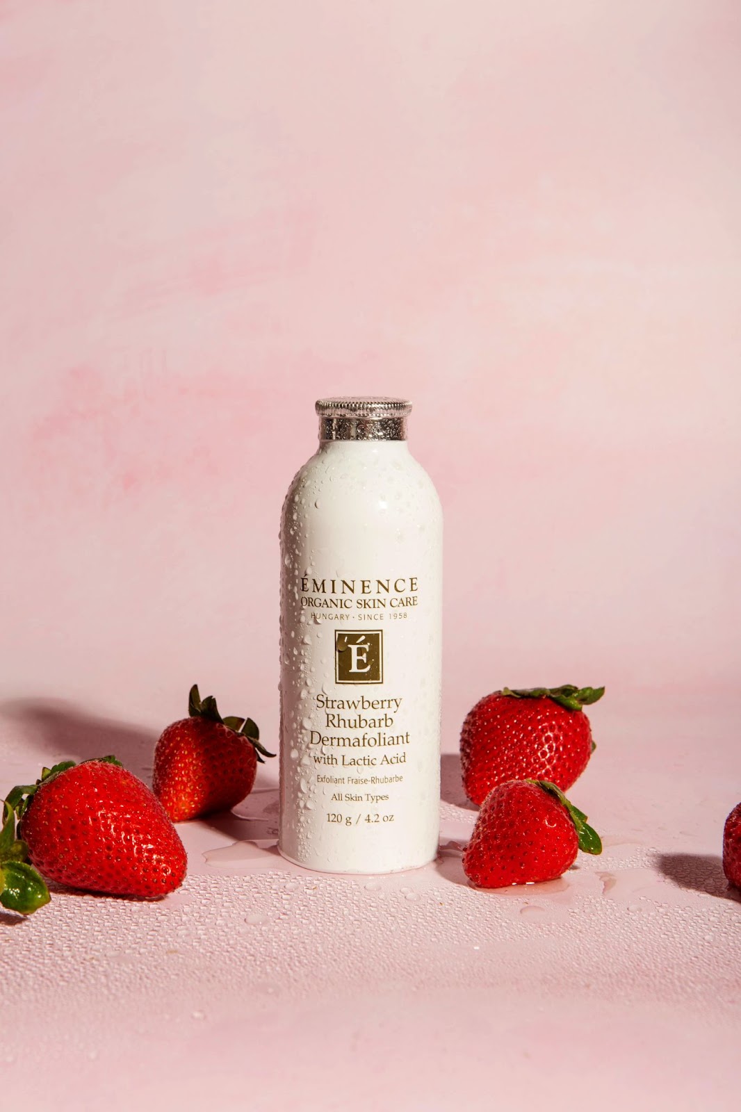 Eminence Organics Strawberry Rhubarb Dermafoliant with strawberries in the photo