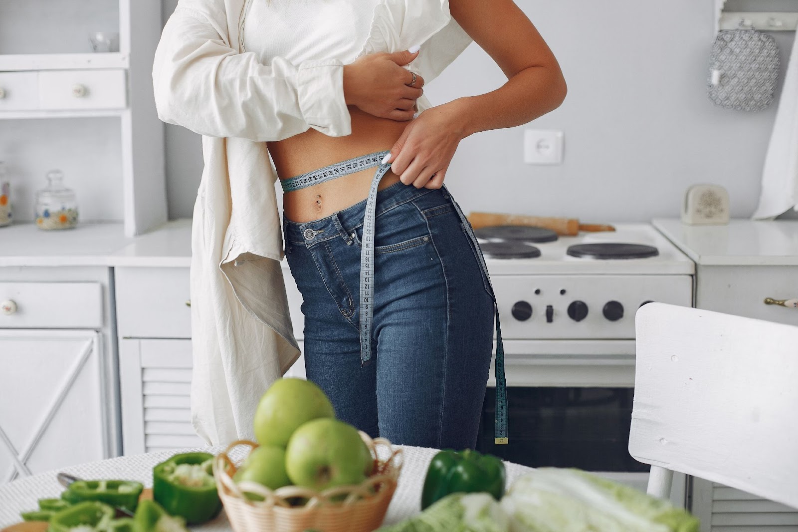 A woman is seen following a well balanced diet for weight loss.