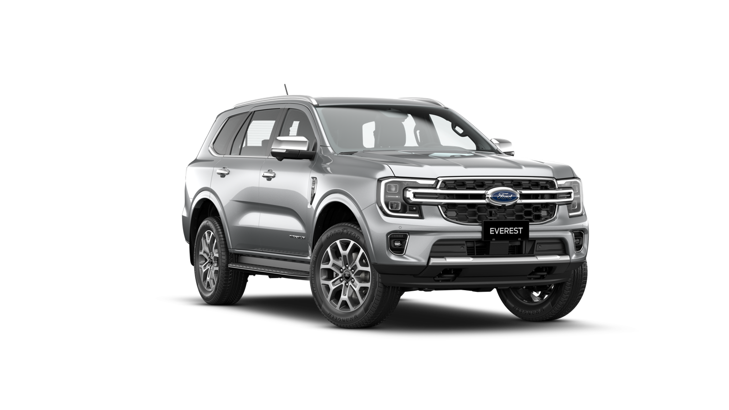 A silver suv with black background

Description automatically generated