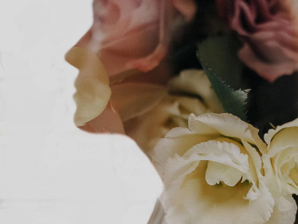 Multi-exposure photo of a woman in roses