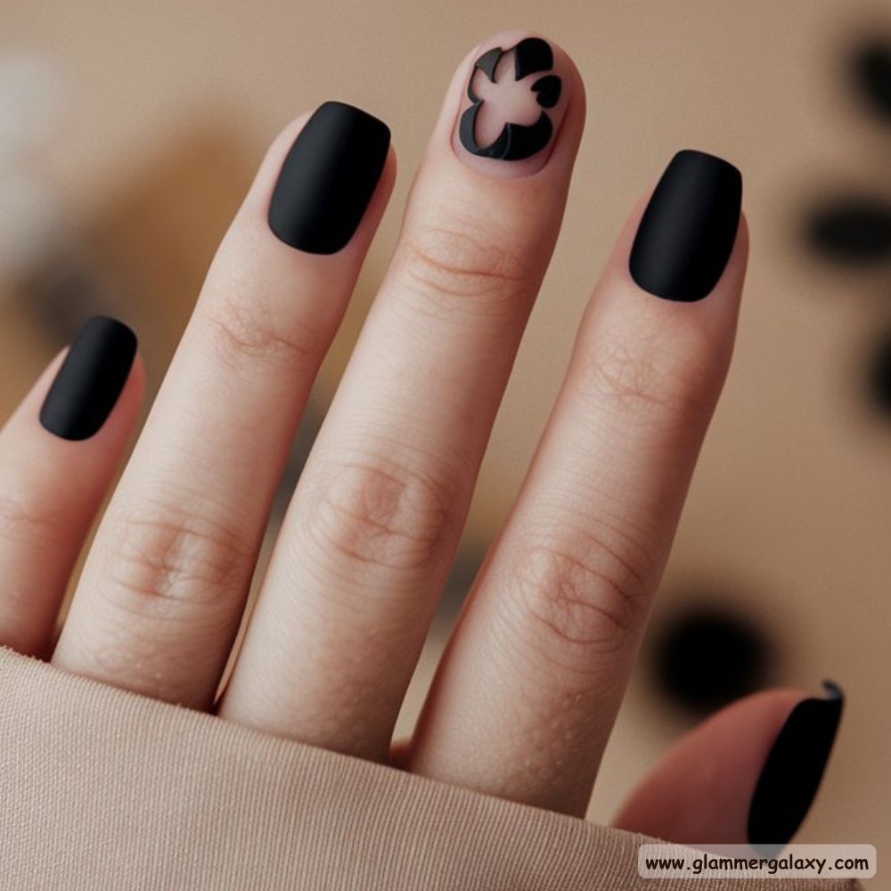 Neutral Winter Nails having Bold Black Statements
