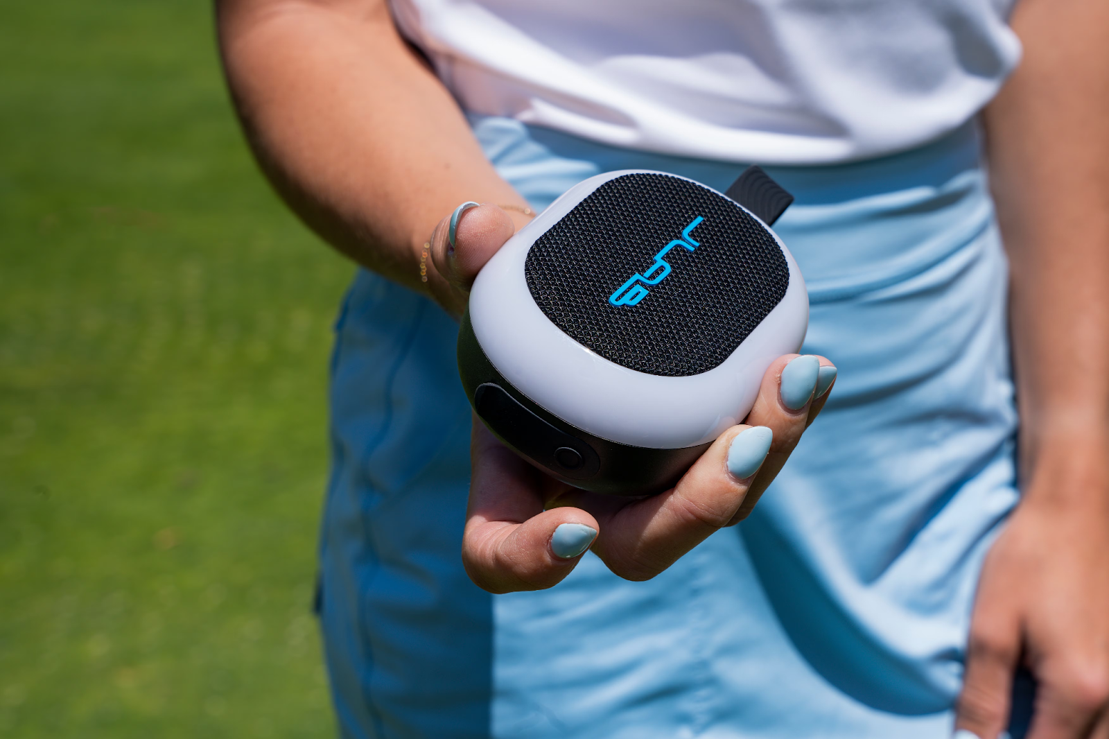Pop Party Speaker in hand.