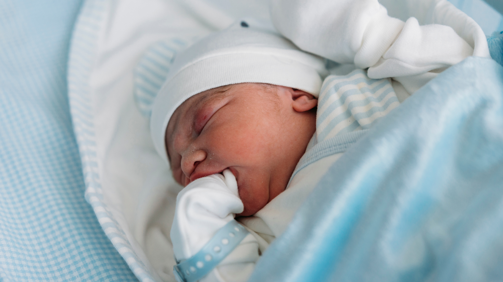 Newborn baby sleeping soundly.