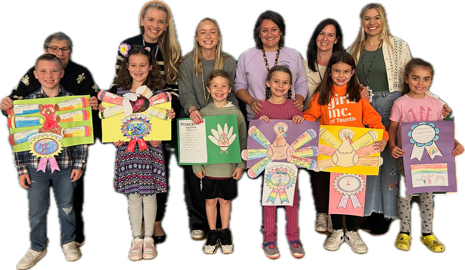 image of staff and students holding their gratitude turkey they made in class