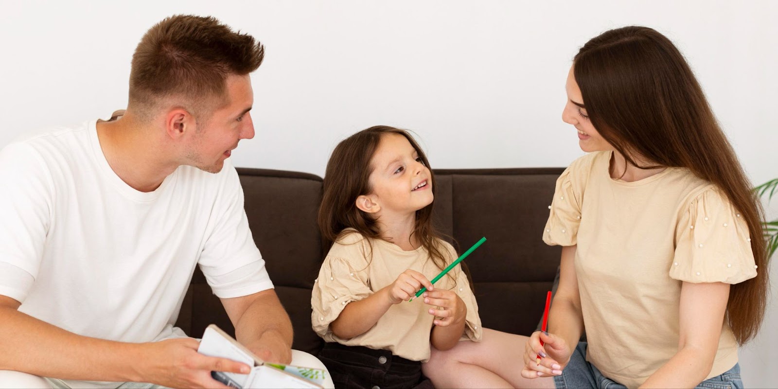 Parents talking to their daughter