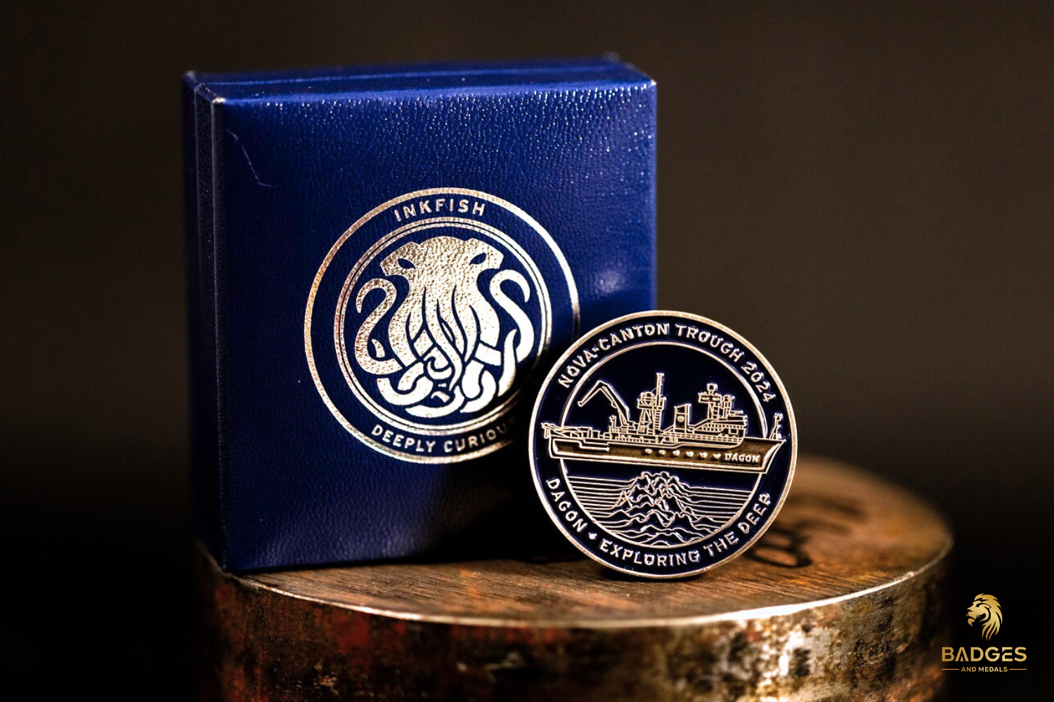 A picture of a custom challenge coin box for Inkfish.