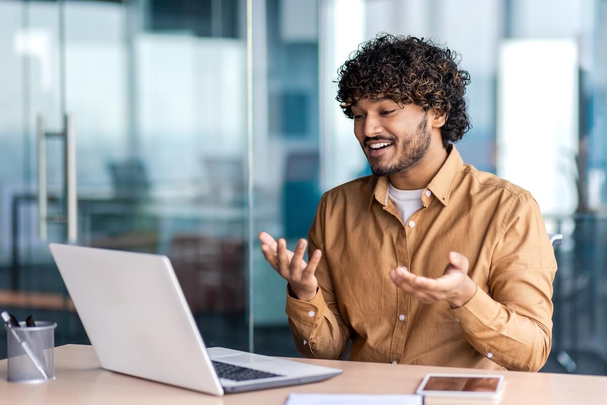 Clinical documentation software: man using his laptop for a video call