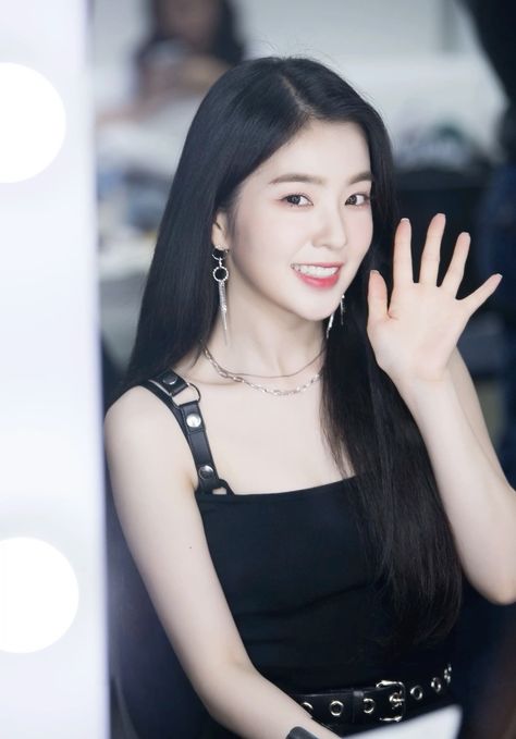 A picture of Irene on a black gown 