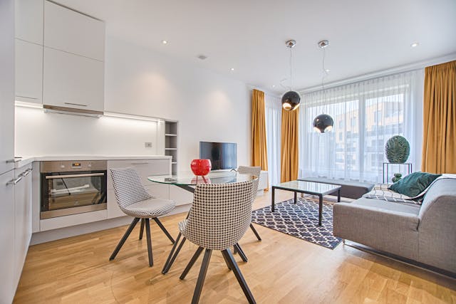 living room with checkered chairs