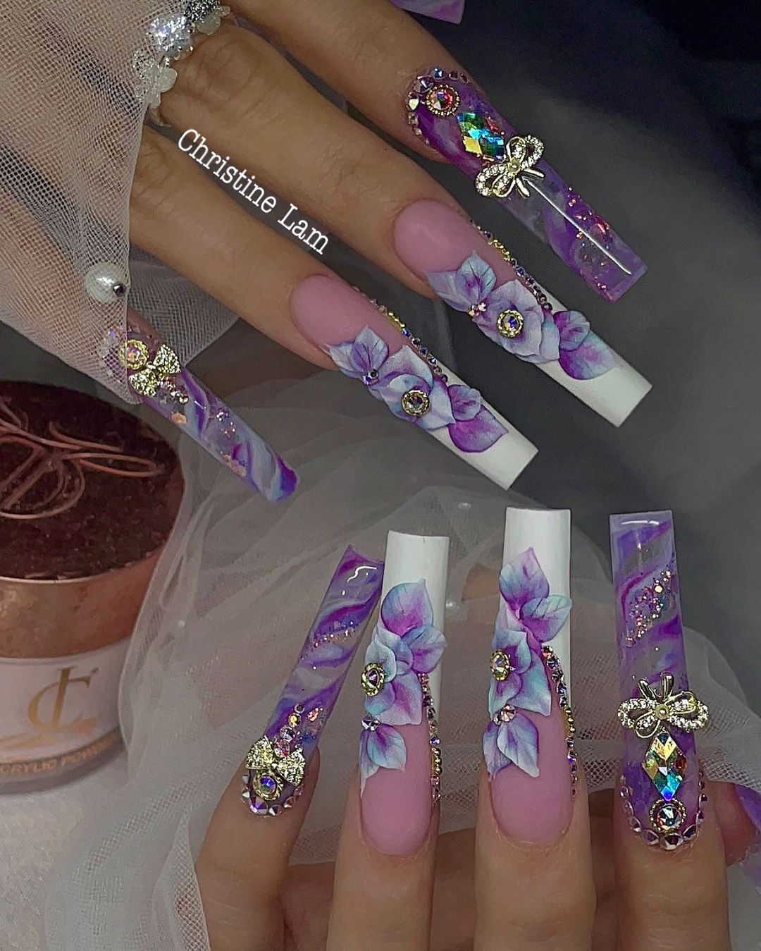 Close-up of hands having lavender nails with wow look