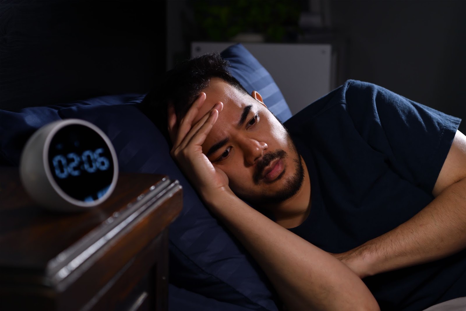 Person having trouble sleeping thinking to replace mattress soon
