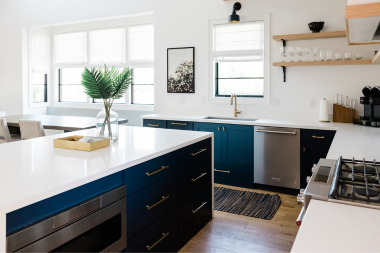 is a full house remodel worth it how to decide if its right for your family kitchen remodeling project with blue cabinets and quartz island custom built michigan