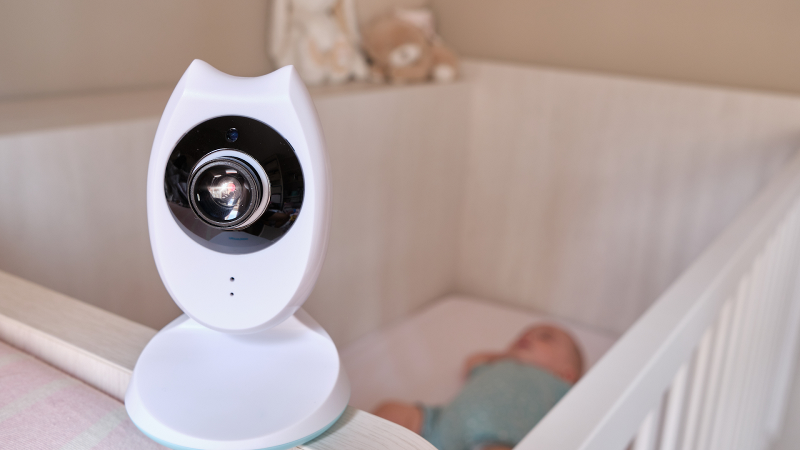 Close up of a baby monitor on crib while baby is sleeping // Healthier Baby Today