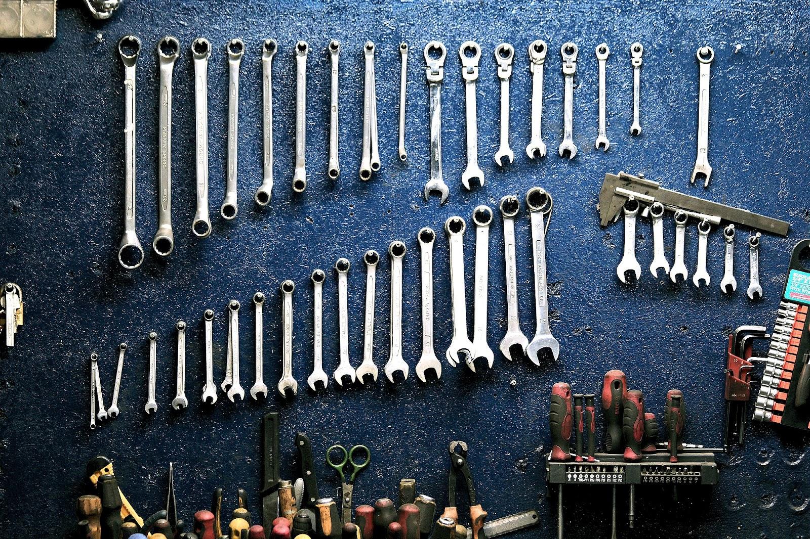 the wrenches are in an organized work space