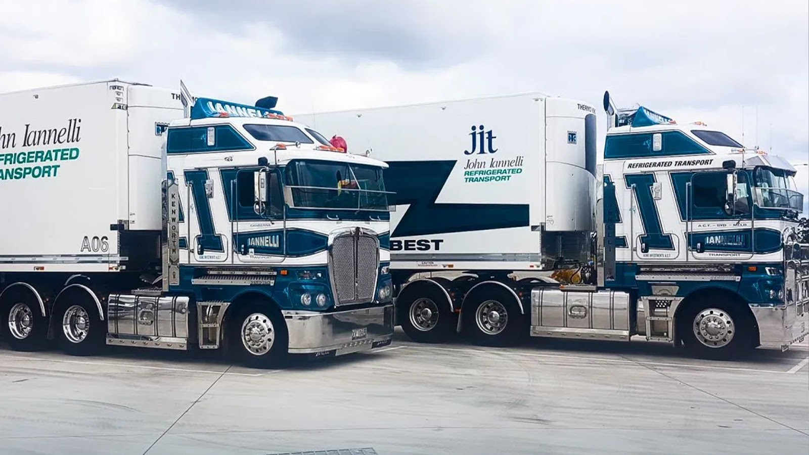 Two adverted and fully equipped white reefer trucks with John Lianelli Transport logos on it. Showcasing how upgraded our services are.