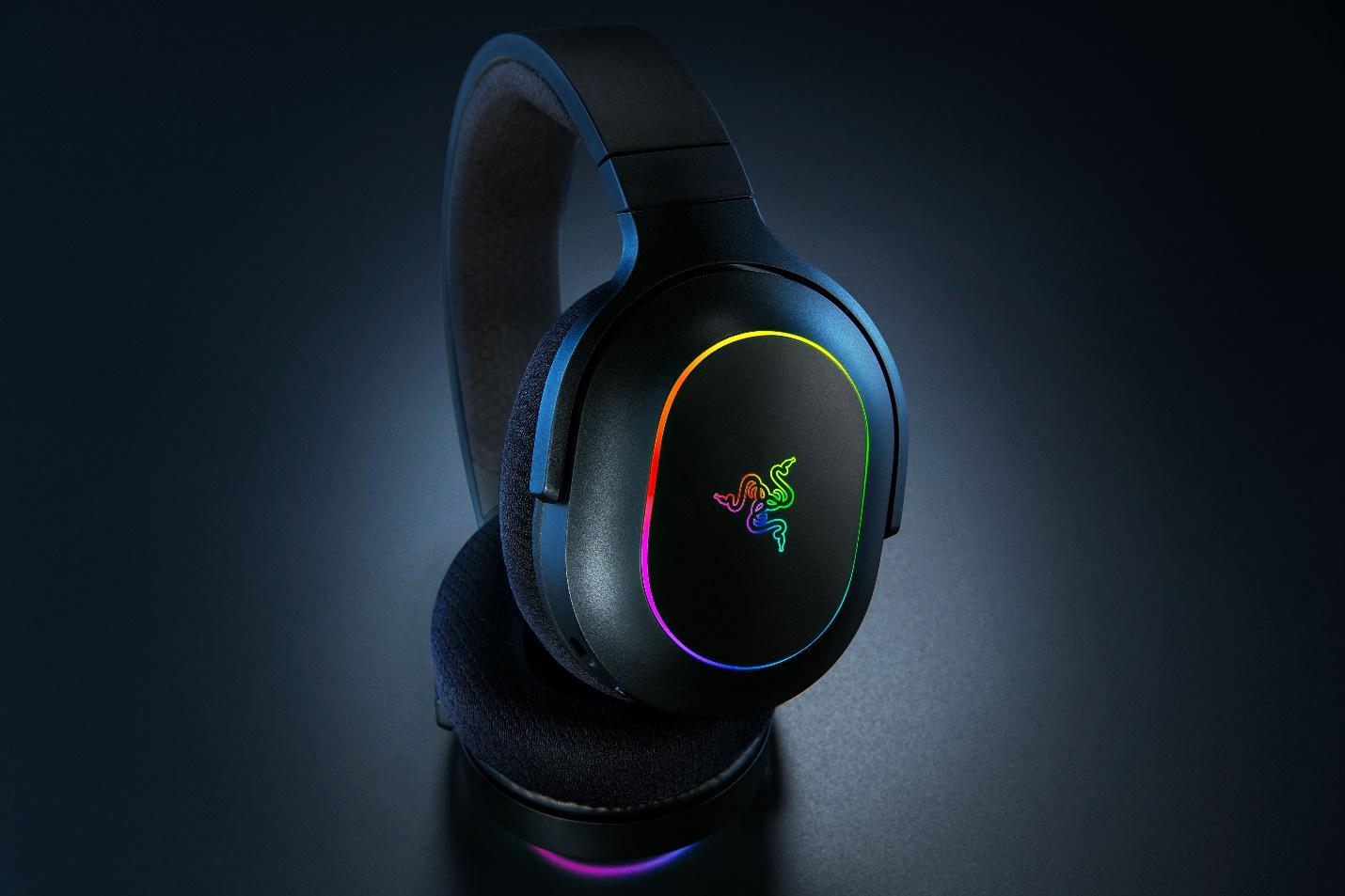 A black headphones with a colorful logo

Description automatically generated