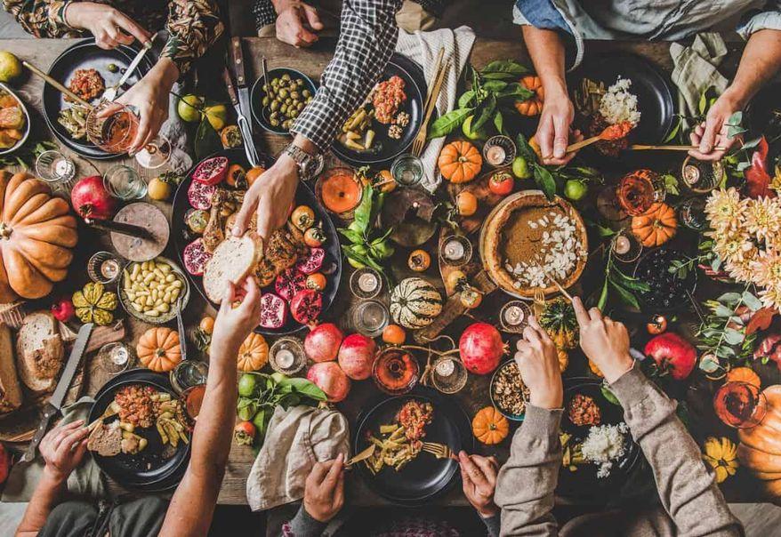 Make this Thanksgiving feel special, even with a smaller crowd. Cozy dinners and new traditions can help usher in happiness. Photo credit: Depositphotos.