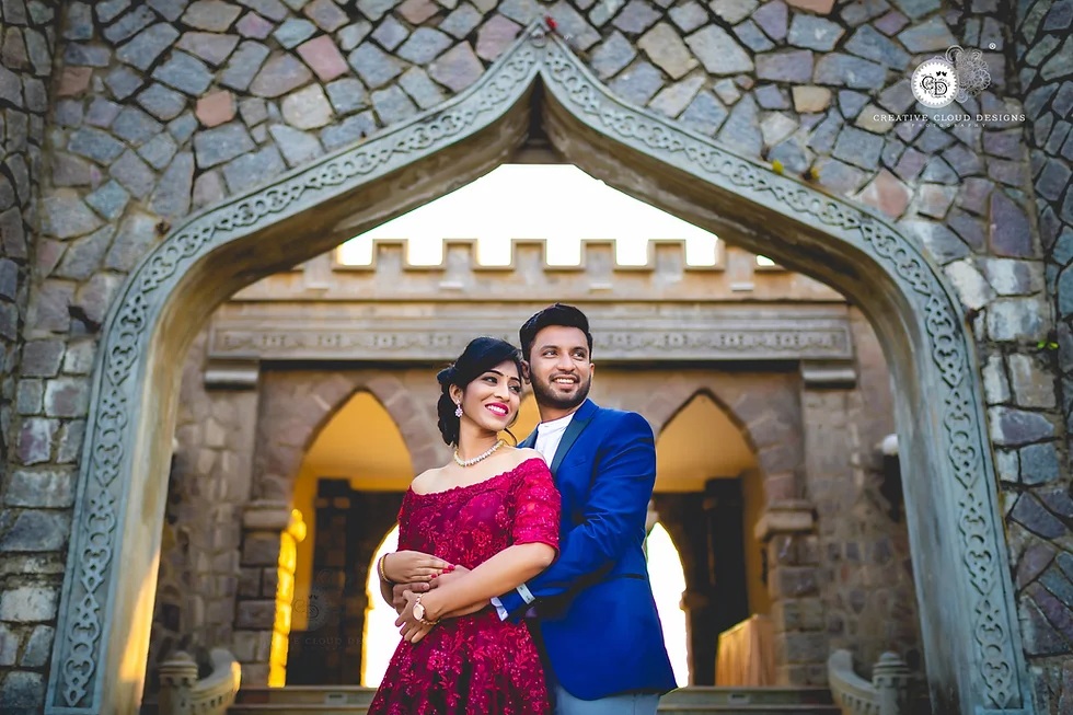 Charming pre-wedding photoshoot of a couple sitting by Ameenpur Lake, lost in each other's gaze