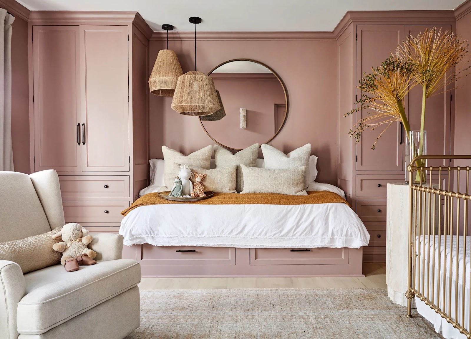 Soft pink kids bedroom with accent plushies