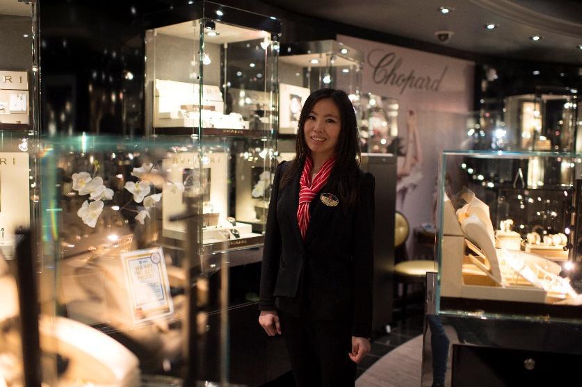 A person standing in a jewelry storeDescription automatically generated