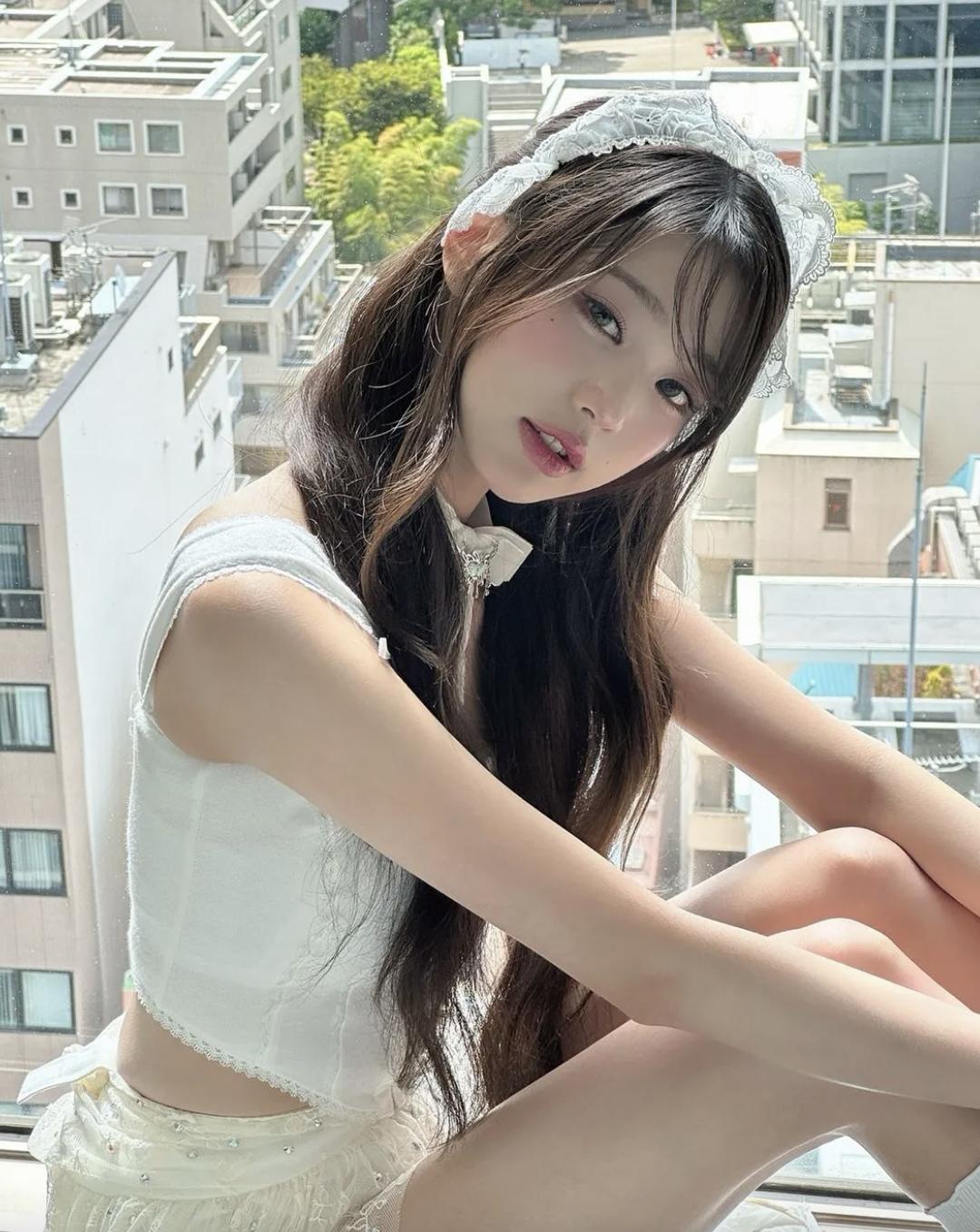 a photo of IVE Wonyoung's on white outfit