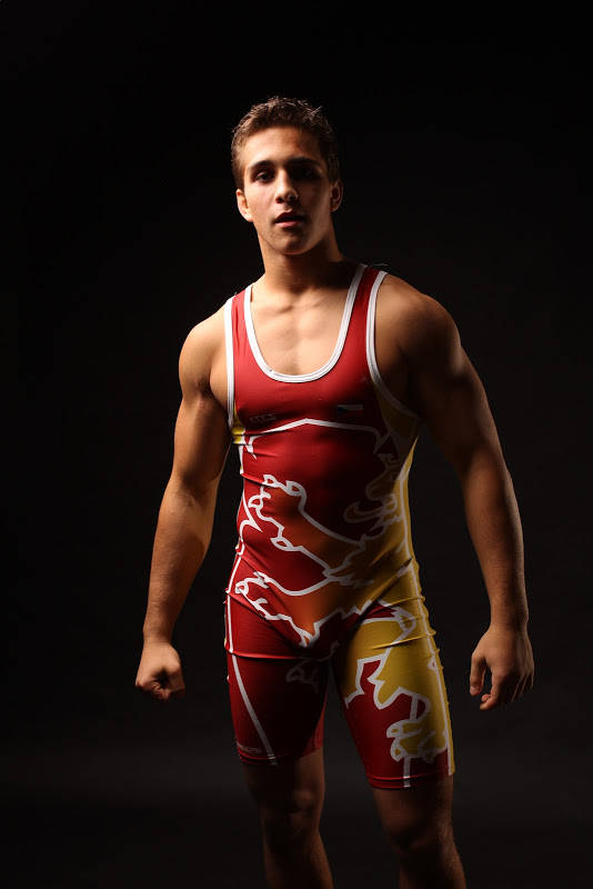 gay college male wearing red tight spandex wrestling singlet