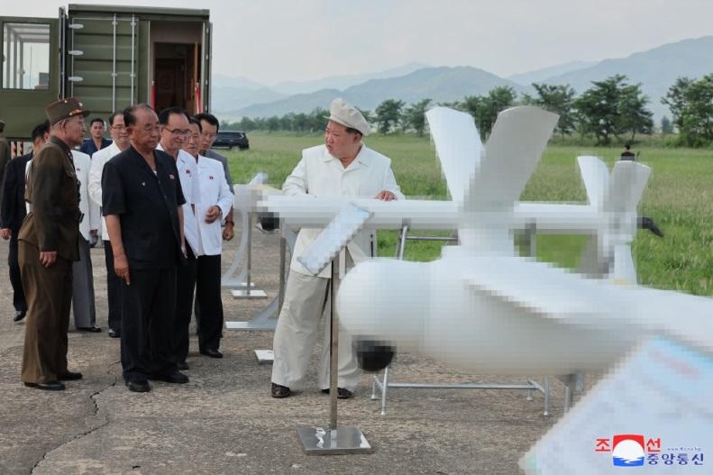 Respected Comrade Kim Jong Un Oversees Performance Test of Drones