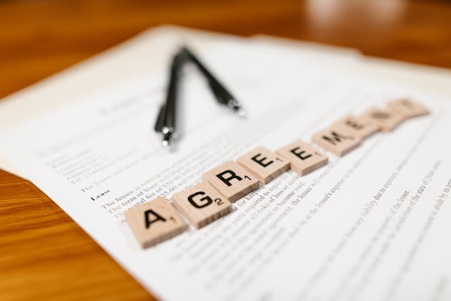 Agreement spelled out in scrabble letters 