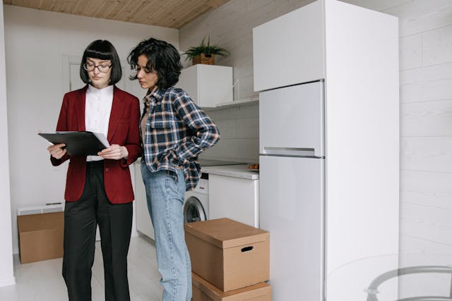 landlord and tenant conducting awalk through inspection