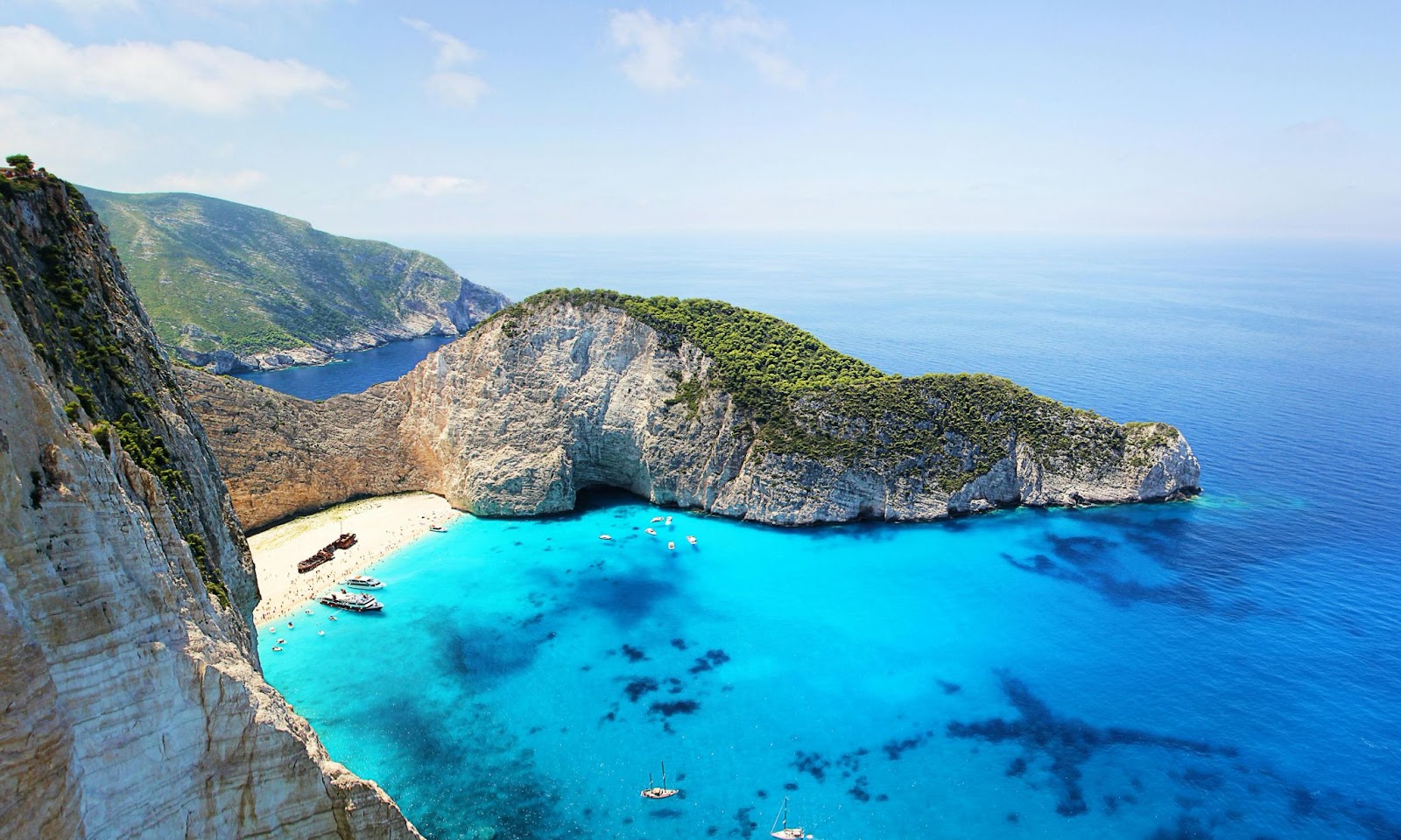 Scenic view of Zakynthos Island, Greece, with turquoise water and cliffs – a popular sailing destination in the Aegean Sea.