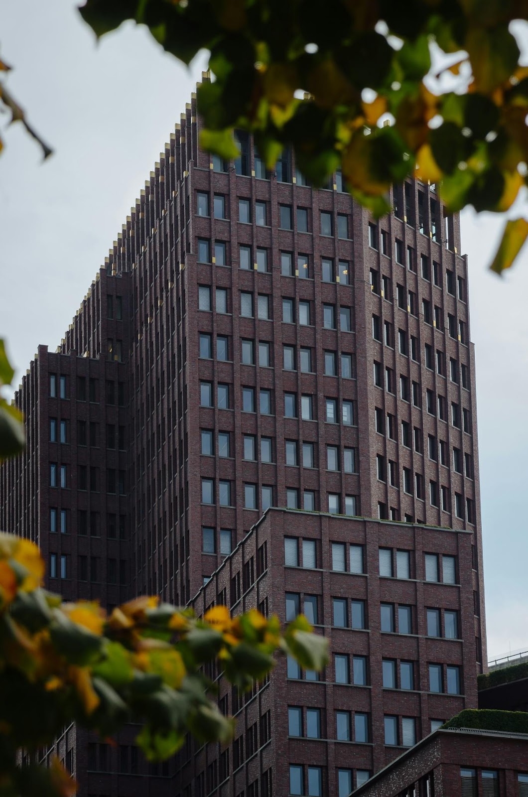 A tall building with a clock on the side of it