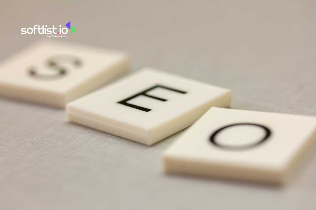 SEO written on Scrabble tiles arranged on a light gray background