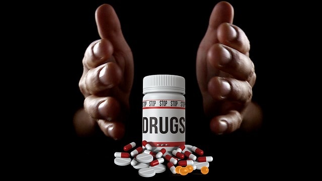 Stop drug addiction concept pic shows selected drugs as concept of testing in the workplace