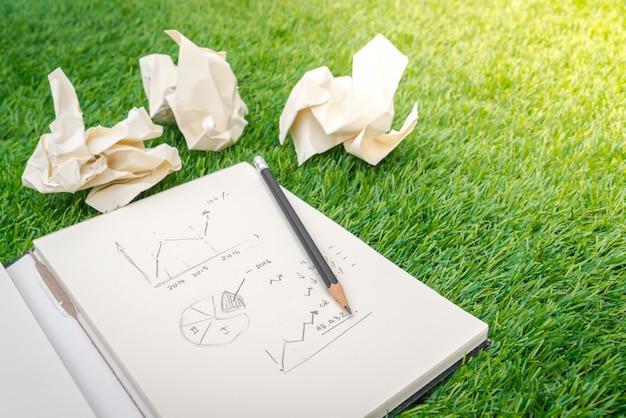 opened book with business concept and graph