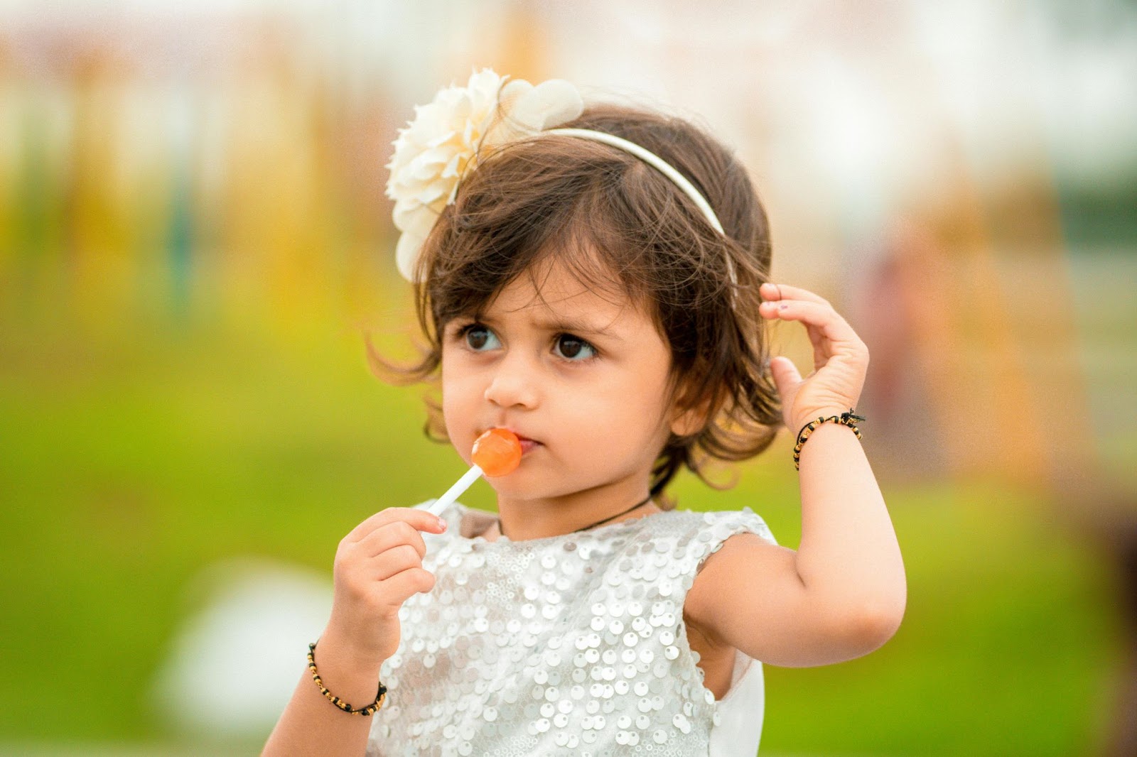 Young Girl with Lollipop