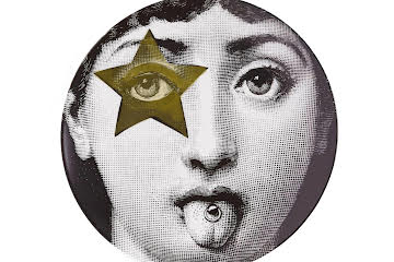 Fornasetti plates featuring golden star eye