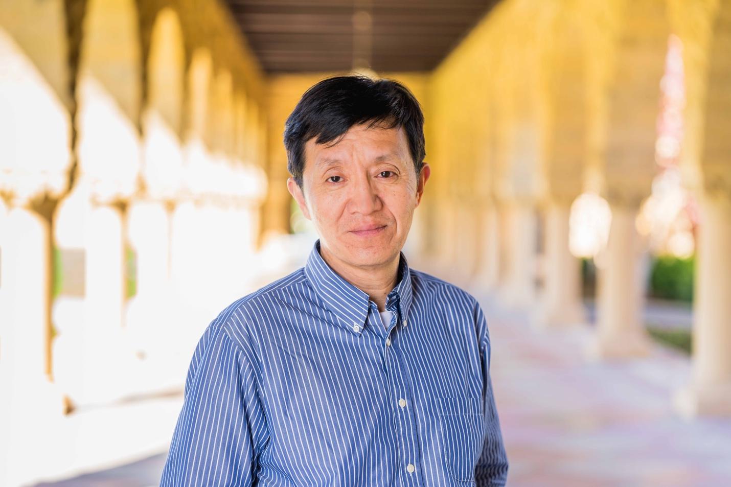 A person in a blue shirt AI-generated content may be incorrect.