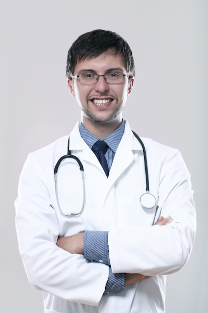 Front profile headshot of a happy medical practitioner