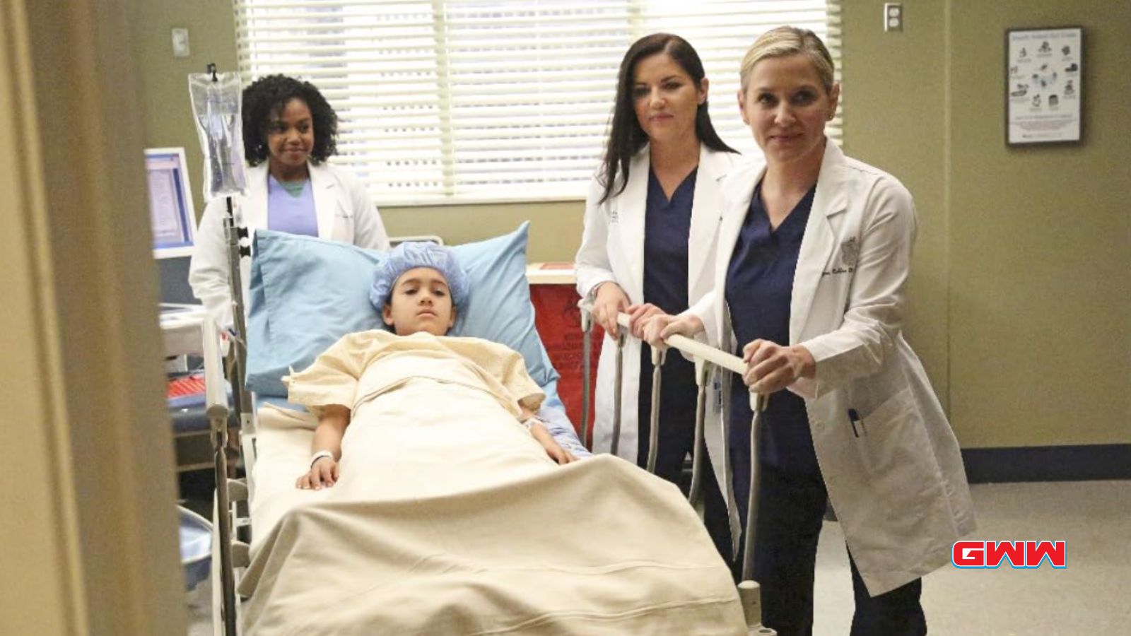 Jessica Capshaw, Marika Dominczyk, Jerrika Hinton with a kid patient, Grey's Anatomy Season 21